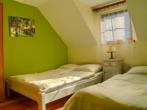 Кровать или кровати в номере Domki Klara