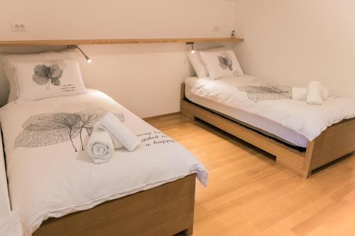 Postel nebo postele na pokoji v ubytování Apartma Tale