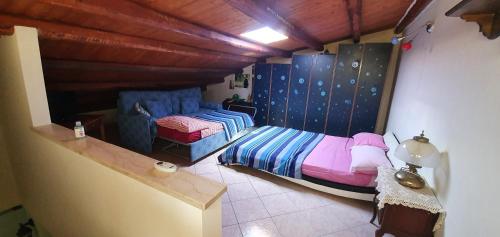 Postel nebo postele na pokoji v ubytování La Casa delle Lodole