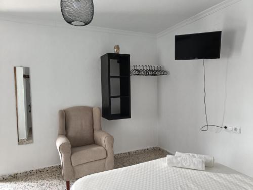A television and/or entertainment centre at Alojamientos La Menúa