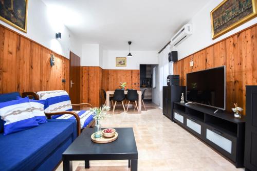 TV a/nebo společenská místnost v ubytování Villa Adriatica