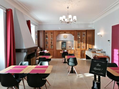 Posezení v ubytování Hôtel Le Dormeux