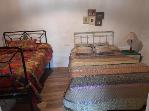 Cama o camas de una habitación en Agradable casa rural en Roblido
