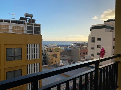 a view of a city from a balcony at Diego´s Home in Arona