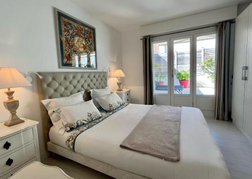 Posteľ alebo postele v izbe v ubytovaní 120m2 avec deux terrasses ensoleillées à Biarritz