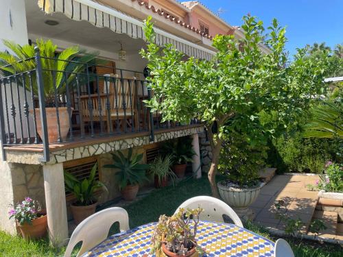 Billede fra billedgalleriet på Adosado con piscina y tenis i Benicàssim