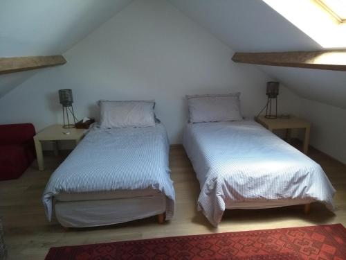 En eller flere senge i et værelse på 10 km from Disneyland Paris Quincy Voisins