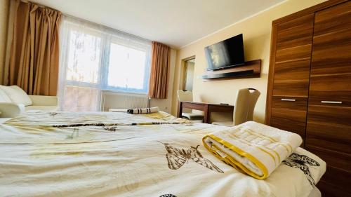 Cama o camas de una habitación en Ubytování Lednice