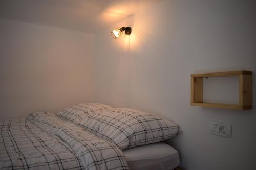 Кровать или кровати в номере Apartment MAIO