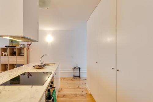 מטבח או מטבחון ב-Almada Luxurious Duplex by DA'HOME