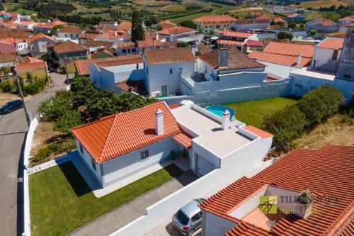 an aerial view of a house with red roofs at Tilli'n'Joe's Nature House in Moita dos Ferreiros