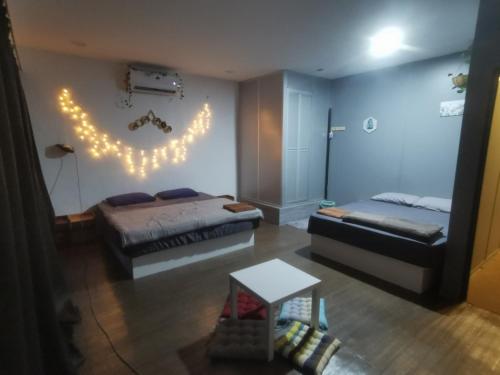 Katil atau katil-katil dalam bilik di Marvel Suite ABNB