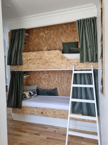 Postel nebo postele na pokoji v ubytování Løkken centrum ferielejlighed-apartment 4E