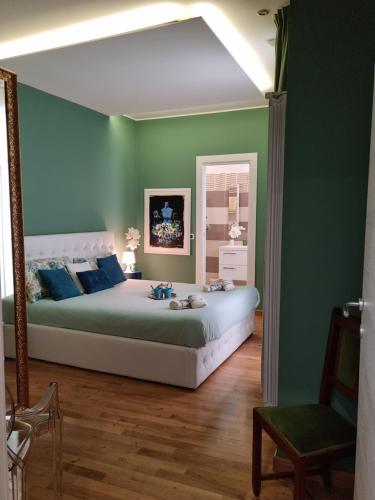 Llit o llits en una habitació de Green Palace