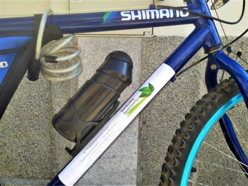 a bike with a drink bottle on the front wheel at Gardunha Apartments Avenida I in Fundão