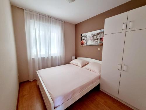 Postel nebo postele na pokoji v ubytování Apartment Iva