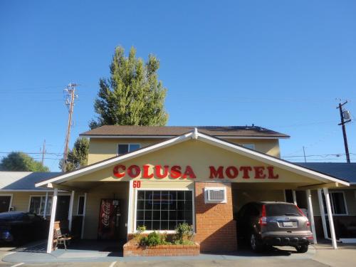 a colusa motel with a car parked in front of it at Colusa Motel in Colusa