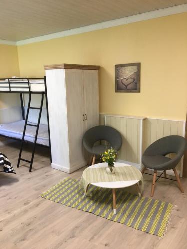 Postel nebo postele na pokoji v ubytování Reinholdi puhkemaja