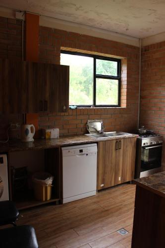 Kuchyň nebo kuchyňský kout v ubytování Guest house Maspindzeli