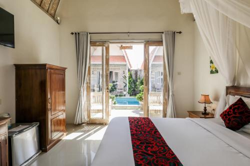 Кровать или кровати в номере The Box Paradise Cottage