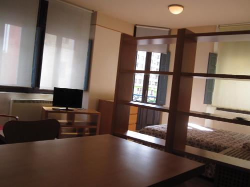 Postel nebo postele na pokoji v ubytování Apartamentos Legazpi