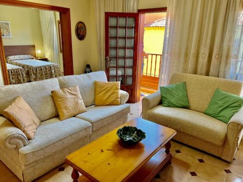 a living room with a couch and a coffee table at Lovely spacious apartment in the center - Vilaflor in Vilaflor