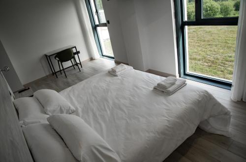 Säng eller sängar i ett rum på Hotel Chips Fene