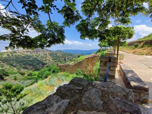 a bench on the side of a road at Apartamento rural el Vidre VT-42035-CS in Vistabella del Maestrazgo