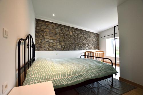 Кровать или кровати в номере Charming holiday house near Durbuy