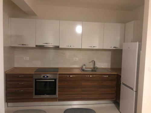 Kuhinja ili čajna kuhinja u objektu Stan Central point Podgorica