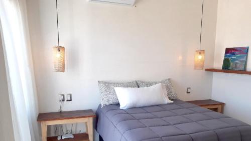 Postel nebo postele na pokoji v ubytování Moyas House