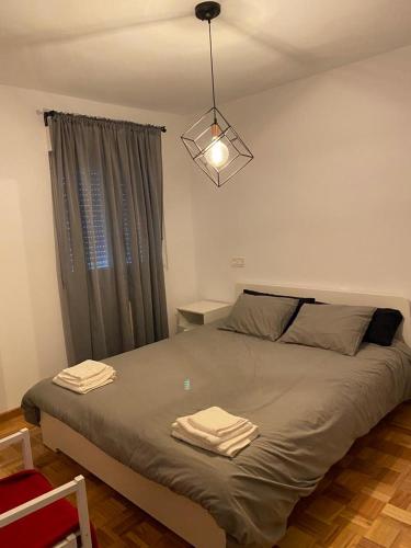 Postel nebo postele na pokoji v ubytování Tranquilo piso en Cimadevilla