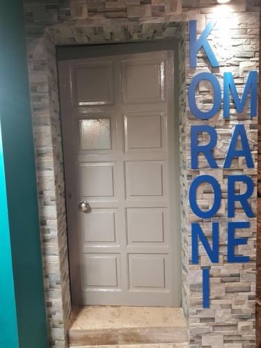 a door with a sign that says i am on the road of me at KORONI MARE -Sea view apartment/διαμέρισμα με θέα στην θάλασσα in Koroni