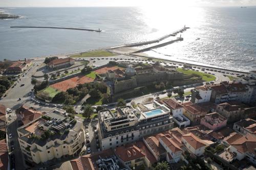 an aerial view of a city next to the ocean at Hotel Boa - Vista in Porto