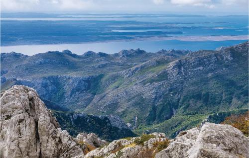 a view from the top of a mountain at Pet Friendly Apartment in Starigrad-Paklenica