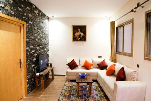 Issli appartment climatisé hiver et étéにあるシーティングエリア