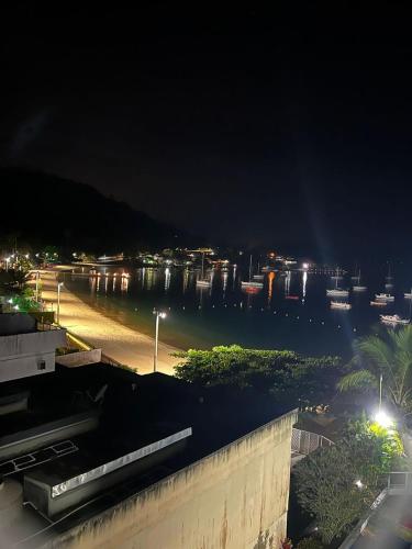 a view of a city at night with a harbor at Angra inn, Angra dos Reis in Angra dos Reis