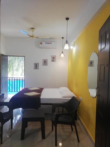 Gambar di galeri bagi Sabinas Goa di Saligao