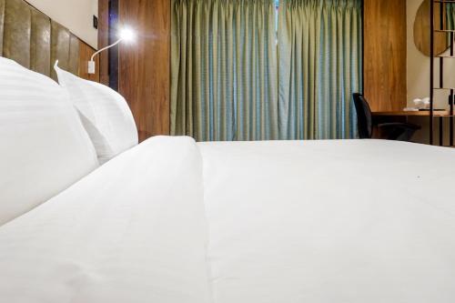 Hotel Oltenにあるベッド