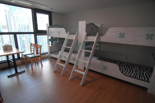 Postel nebo postele na pokoji v ubytování Dynamic Guesthouse