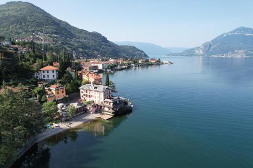 an aerial view of a town in the middle of a lake at Hotel Meridiana in Bellano