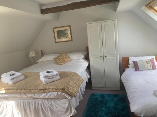 Ένα ή περισσότερα κρεβάτια σε δωμάτιο στο The Lampet Arms