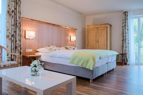 Hotel Spreeblick tesisinde bir odada yatak veya yataklar