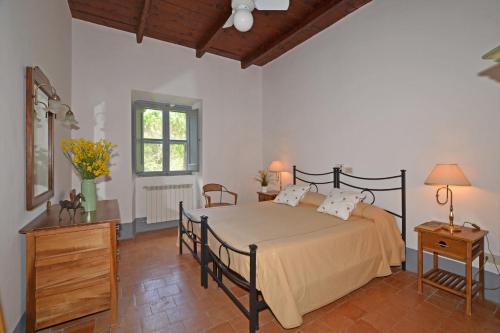 Ένα ή περισσότερα κρεβάτια σε δωμάτιο στο Casale Teresa
