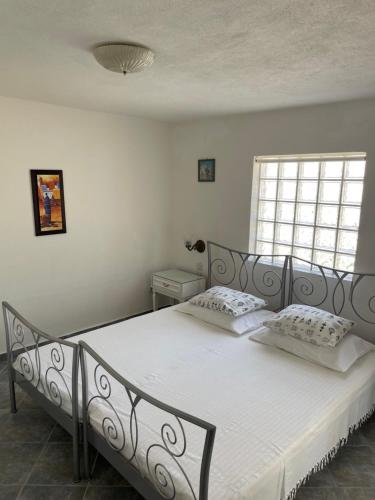 Postel nebo postele na pokoji v ubytování Luxury apartments SYCAMORE 4*