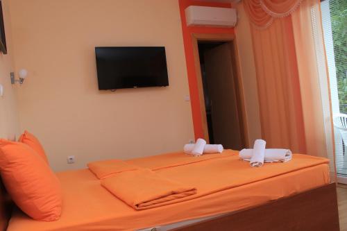 Postel nebo postele na pokoji v ubytování Villa Mimi