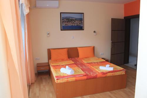 Postel nebo postele na pokoji v ubytování Villa Mimi