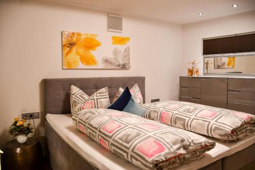 Ένα ή περισσότερα κρεβάτια σε δωμάτιο στο Ferienwohnung Dina