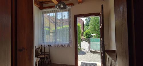 a door leading into a room with a patio at Chalupa na Koskách in Třeboň