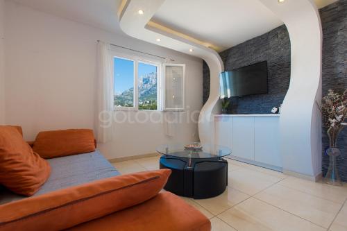 TV a/nebo společenská místnost v ubytování Apartment Vesna With Balcony & Free Parking